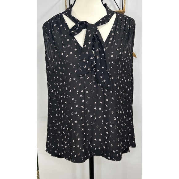 Free People Tops - Free People pink and black sleeveless blouse with accent‎ neck ribbon Size S